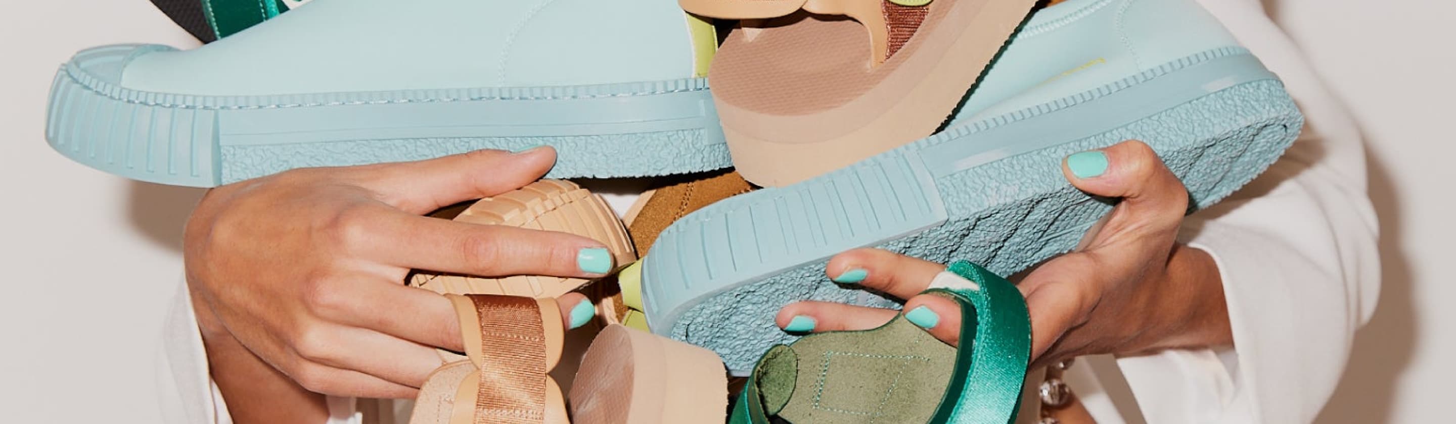Woman holding shoes